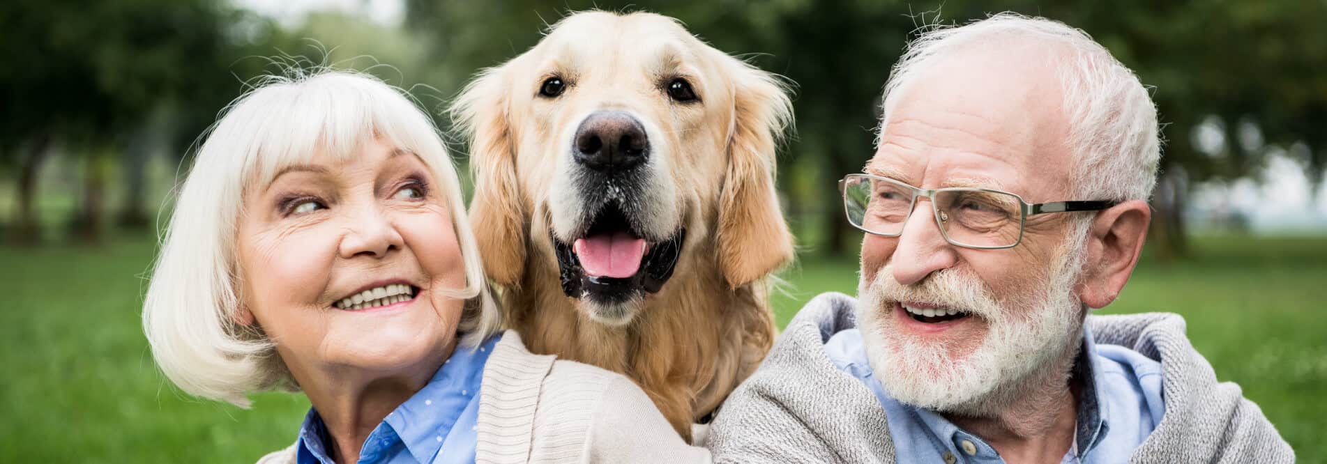 Elderly couple with dog