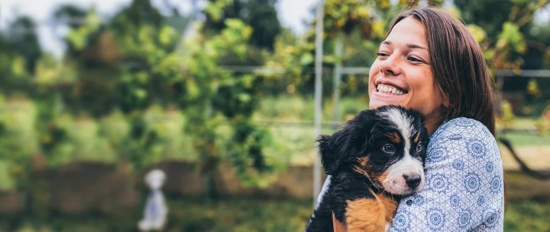 Woman holding dog