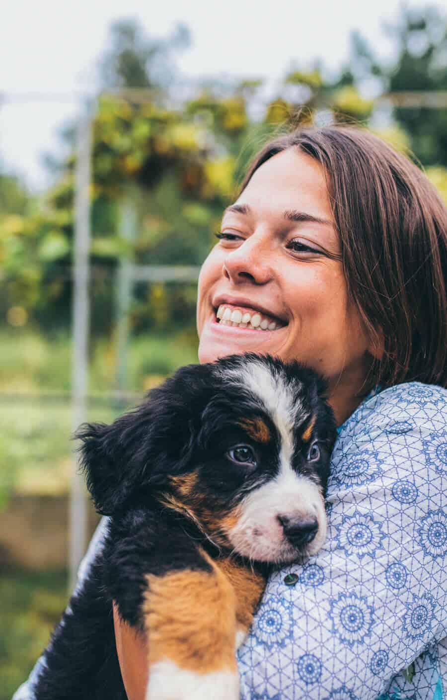 Woman holding puppy